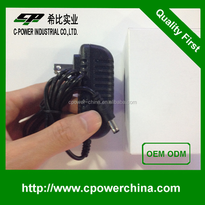 Fornecimento de energia em corrente contínua 5V 12V 24V Tipo de saída Preto 500mA 1A 2A Adaptador para dispositivos eletrônicos